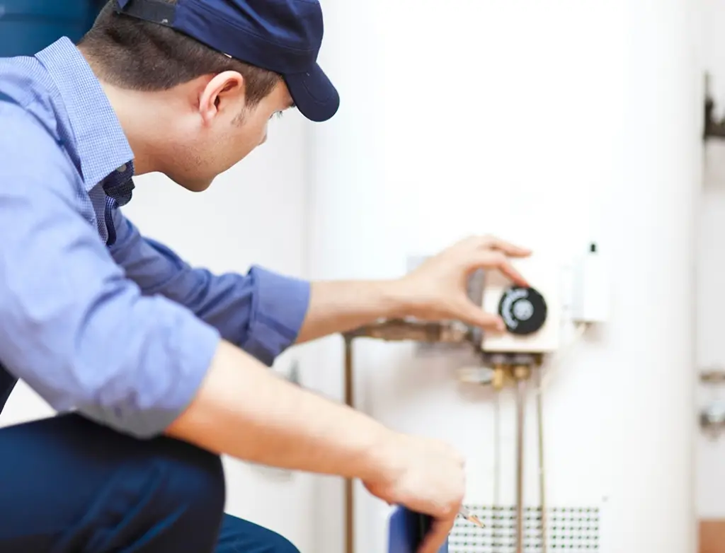 Man fixing heater
